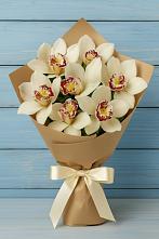 Букет цветов из:  Орхидеи и Розы в Сургуте